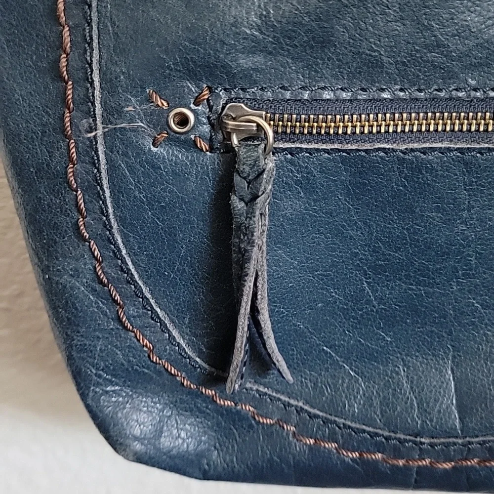 The Sak Navy Blue Leather Hobo with Brown Braided Strap